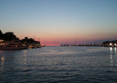 sunset in Zadar Croatia harbour yachts fishing boats
